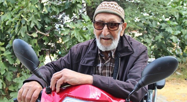 Akülü motorun üstünde kara lastikli 92'lik çınar