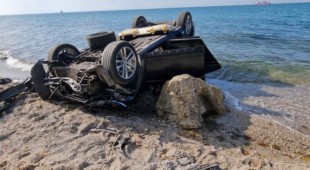 Haciz gelince otomobilini uçurumdan attı