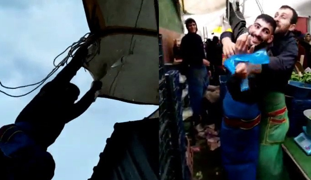 Fırtına çadırını bağlamaya çalışan pazarcıyı uçurdu! Arkadaşı bacağından tutarak kurtardı