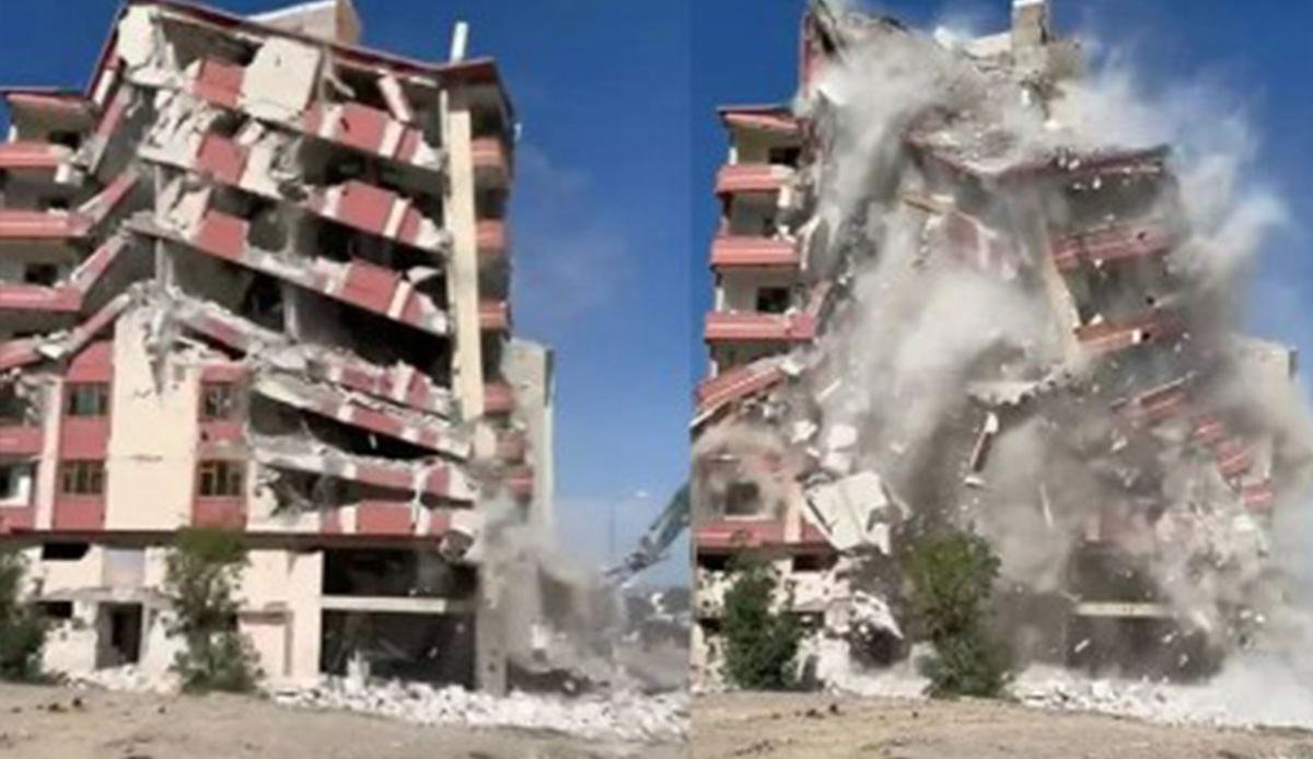 Ağır hasarlı bina, tek dokunuşla yıkıldı