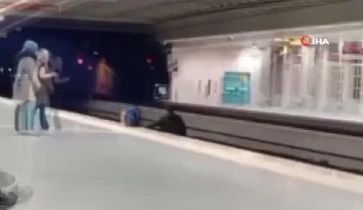 Metroda tehlikeli anlar! Canını hiçe saydı, raylara atlayarak karşıya geçti