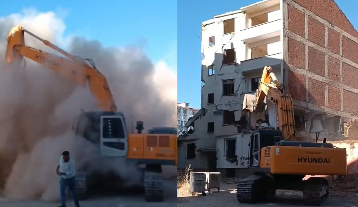 Ağır hasarlı bina tek dokunuşla yıkıldı