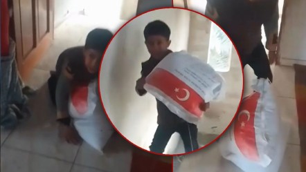 Un çuvalına sarılan çocuk yürekleri sızlattı! Türkiye'den gelen yardım sosyal medyayı ağlattı - Yaşam