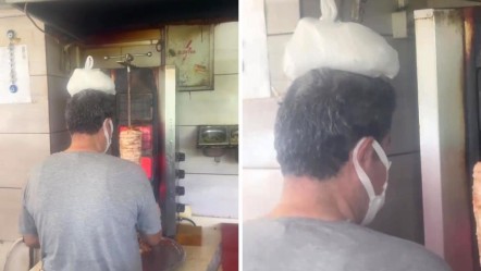 Kavurucu sıcakta zorlu mesai! Kafasına buz torbası koyarak serinlemeye çalıştı - Yaşam