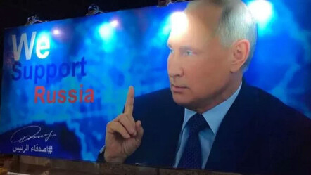 Bağdat'ta ortalığı karıştıran gizem: Dev Putin posteri halkı isyan ettirdi - dunya